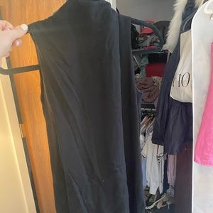 Sen high low Black Top. High neck, shorter in front longer in back.